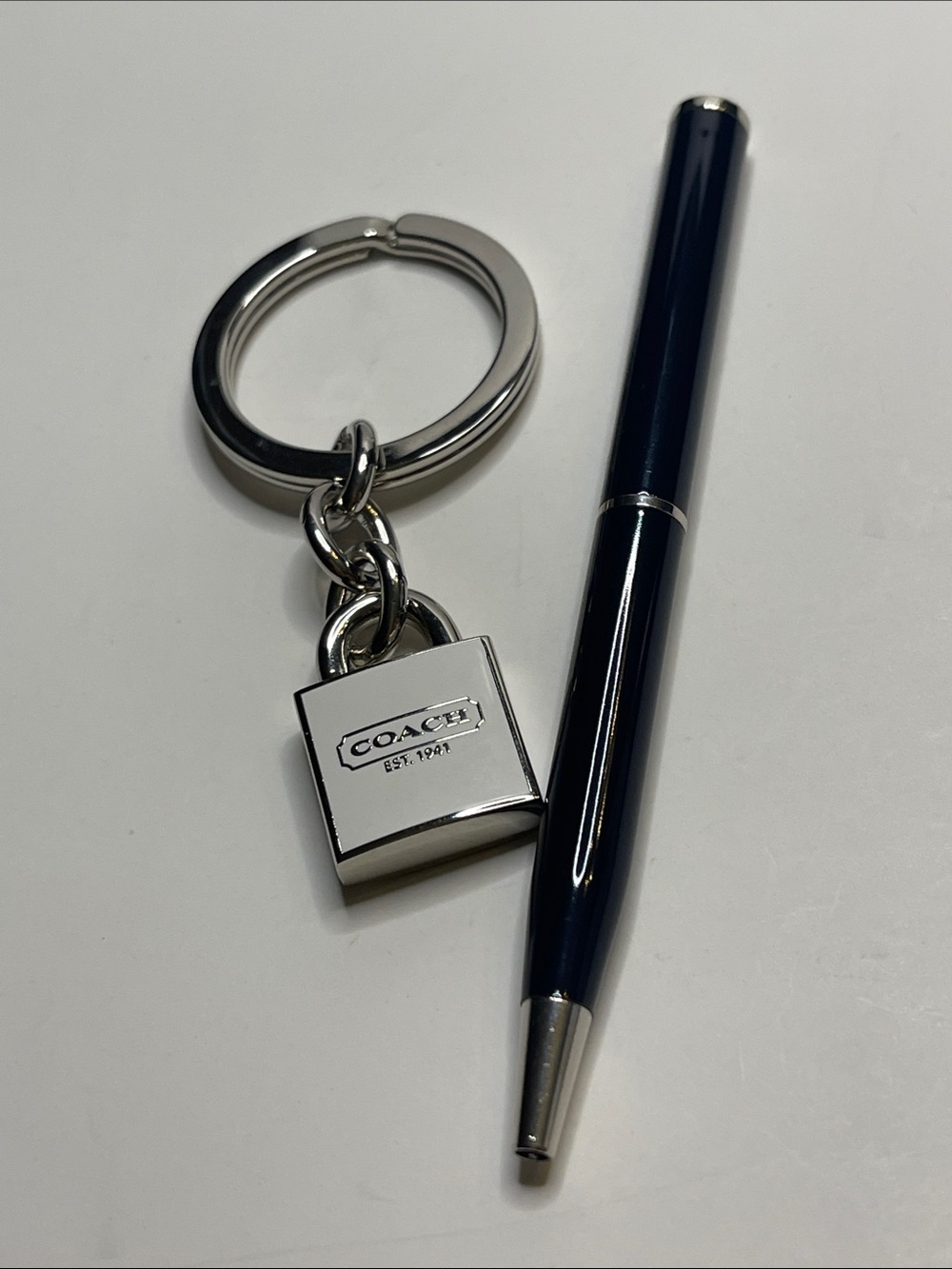 Coach White Padlock Keyring with Coach Pen